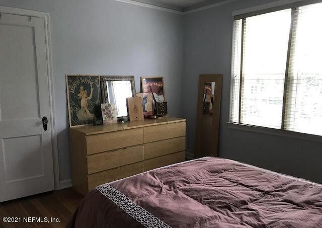 1677 Geraldine Drive Jacksonville, FL 32205 - Photo 28 of 52 a bedroom with a bed and a dresser