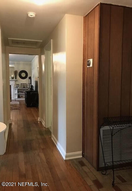 1677 Geraldine Drive Jacksonville, FL 32205 - Photo 35 of 52 a view of a hallway with wooden floor windows and livingroom
