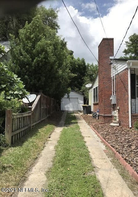 1677 Geraldine Drive Jacksonville, FL 32205 - Photo 39 of 52 a front view of a house with garden