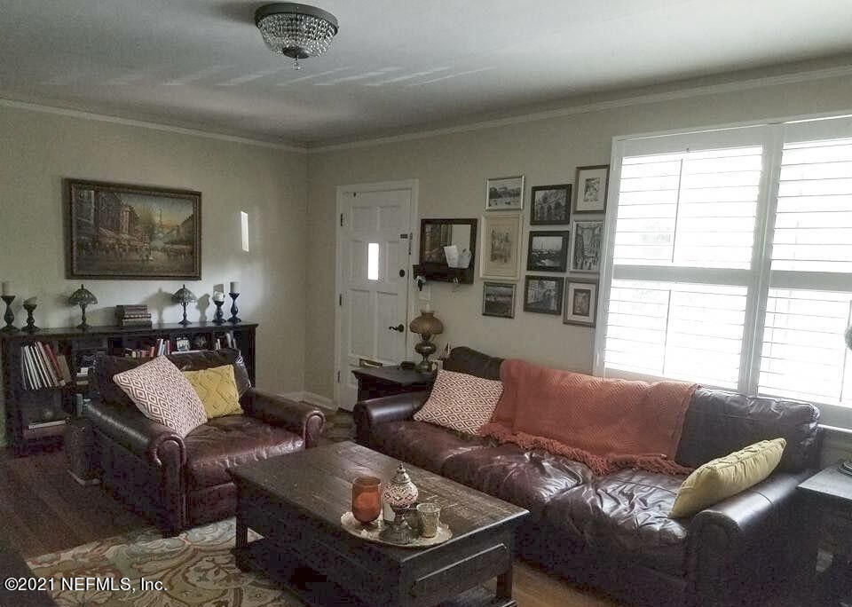 1677 Geraldine Drive Jacksonville, FL 32205 - Photo 9 of 52 a living room with furniture and a window
