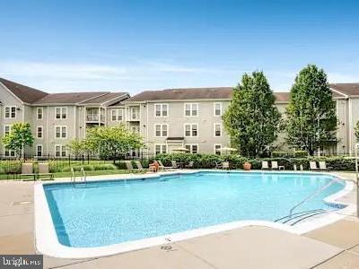 4910 Edgeware Terrace Frederick, MD 21703 - Photo 9 of 9 a view of outdoor space yard and swimming pool