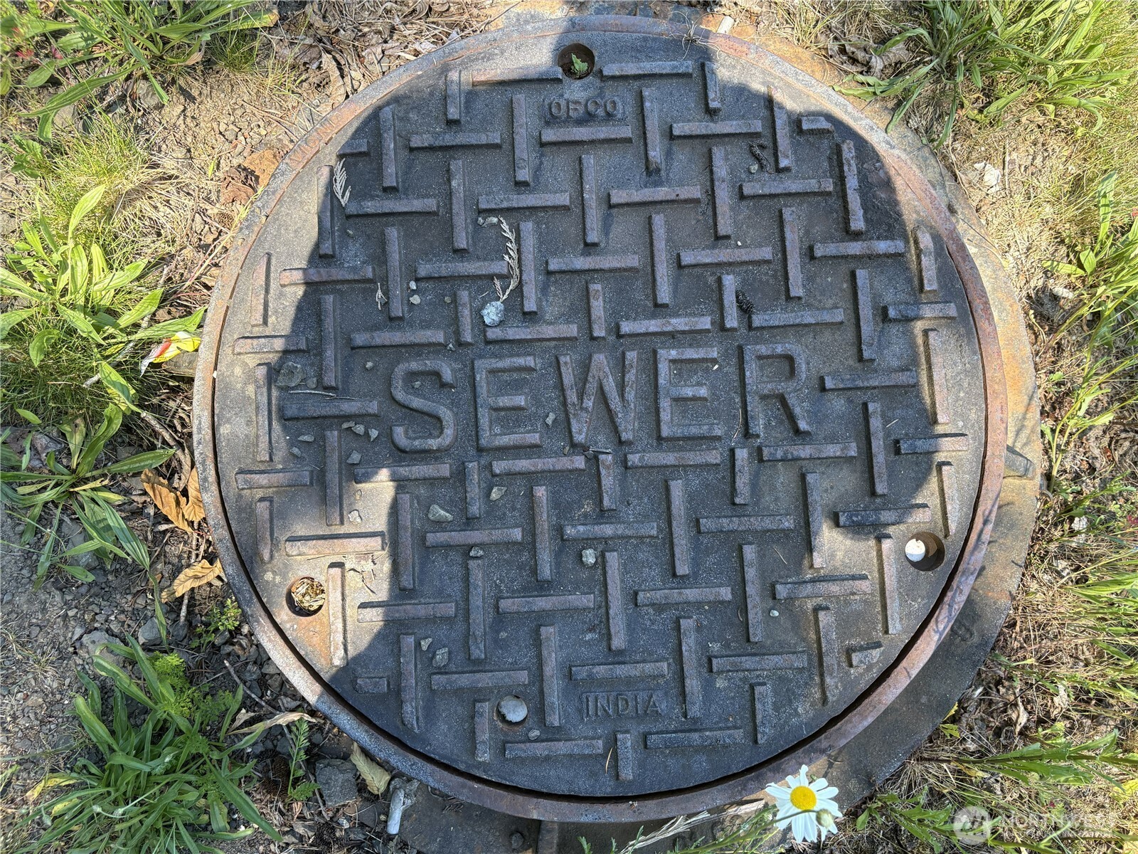 20249 Highway 305 Poulsbo, WA 98370 - Photo 14 of 25 a view of a multi story residential apartment building with a yard