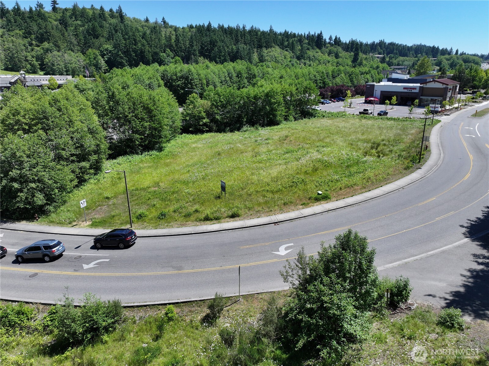 20249 Highway 305 Poulsbo, WA 98370 - Photo 24 of 25 a view of a garden with cars parked