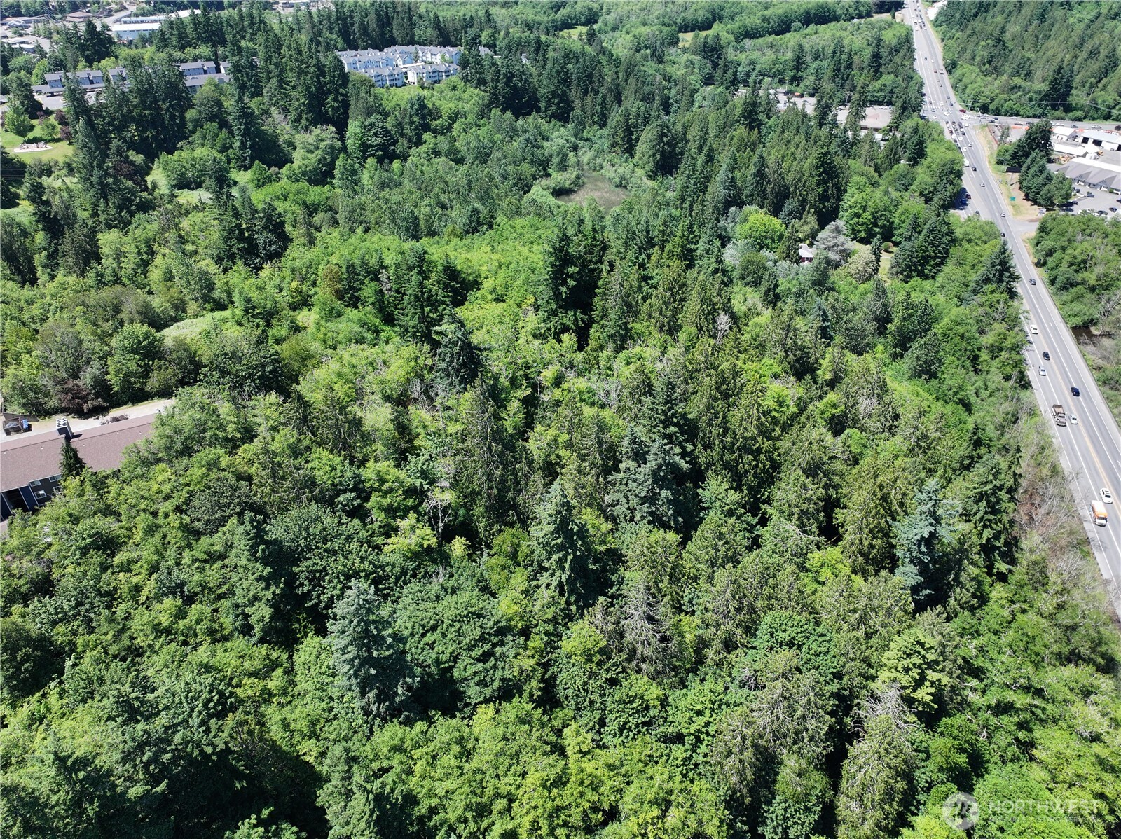 20249 Highway 305 Poulsbo, WA 98370 - Photo 9 of 25 an aerial view of residential house with outdoor space and trees all around