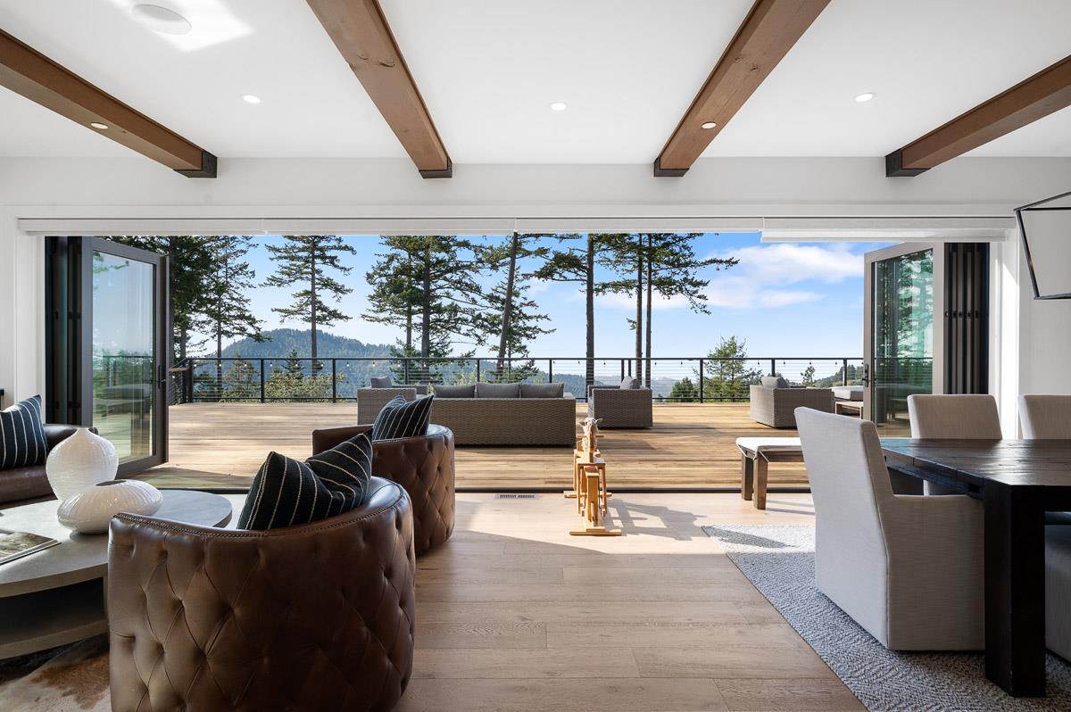 220 Ware Road Woodside, CA 94062 - Photo 14 of 59 a living room with fireplace furniture and a large window