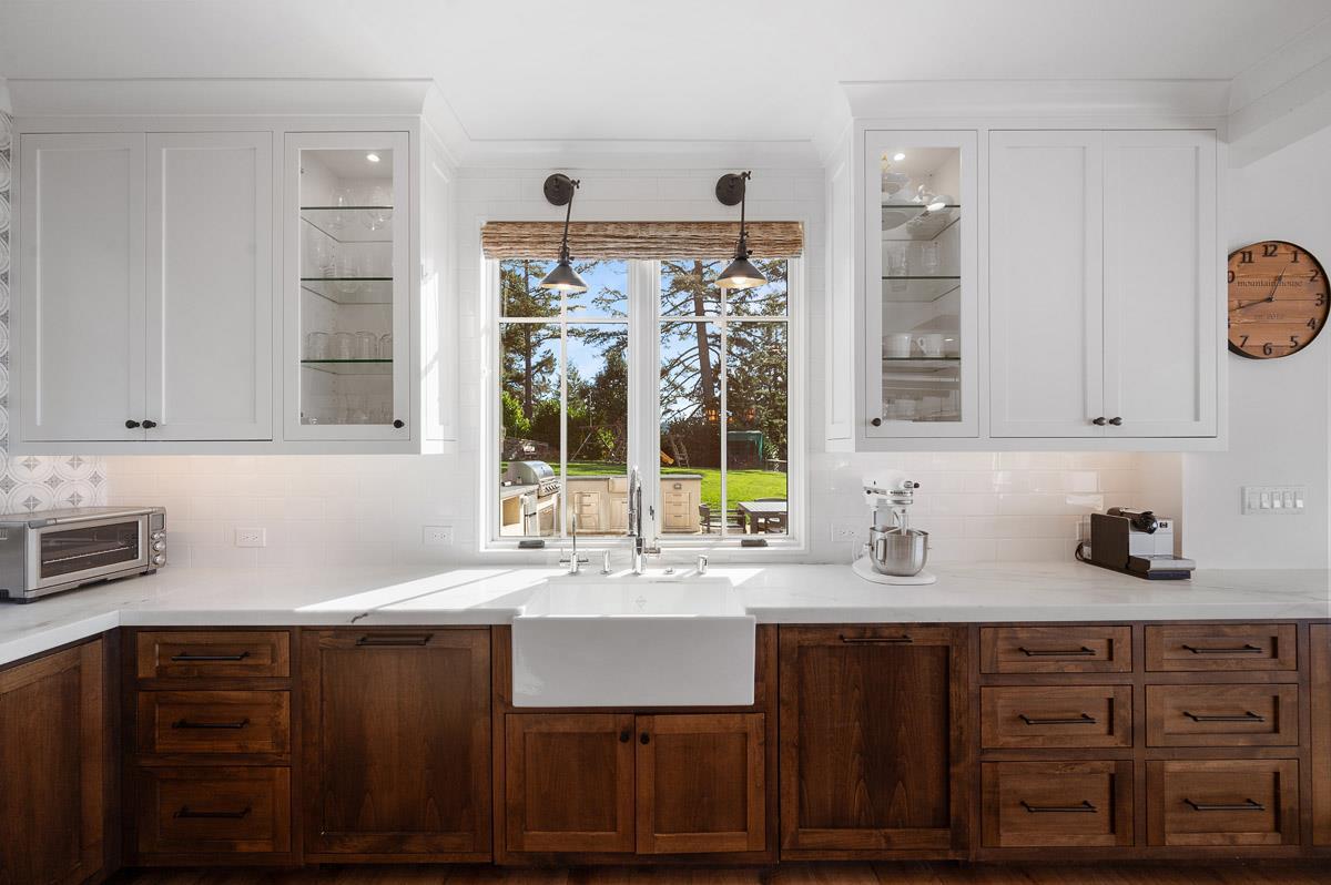 220 Ware Road Woodside, CA 94062 - Photo 19 of 59 a kitchen with a sink cabinets and window