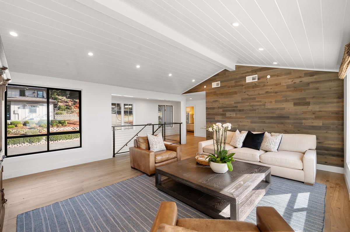 220 Ware Road Woodside, CA 94062 - Photo 21 of 59 a living room with furniture and a large window
