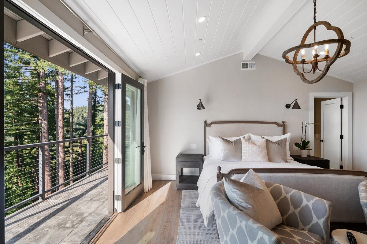 220 Ware Road Woodside, CA 94062 - Photo 24 of 59 a bedroom with furniture and a large window