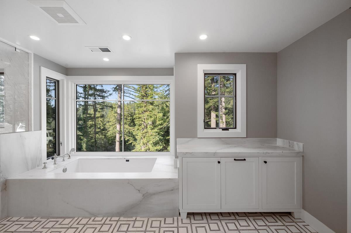 220 Ware Road Woodside, CA 94062 - Photo 25 of 59 a bathroom with a bathtub and a shower