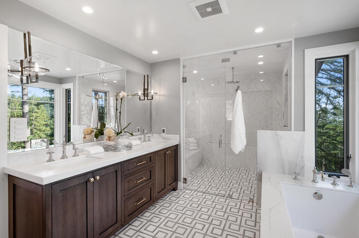 220 Ware Road Woodside, CA 94062 - Photo 26 of 59 a bathroom with a double vanity sink mirror and shower