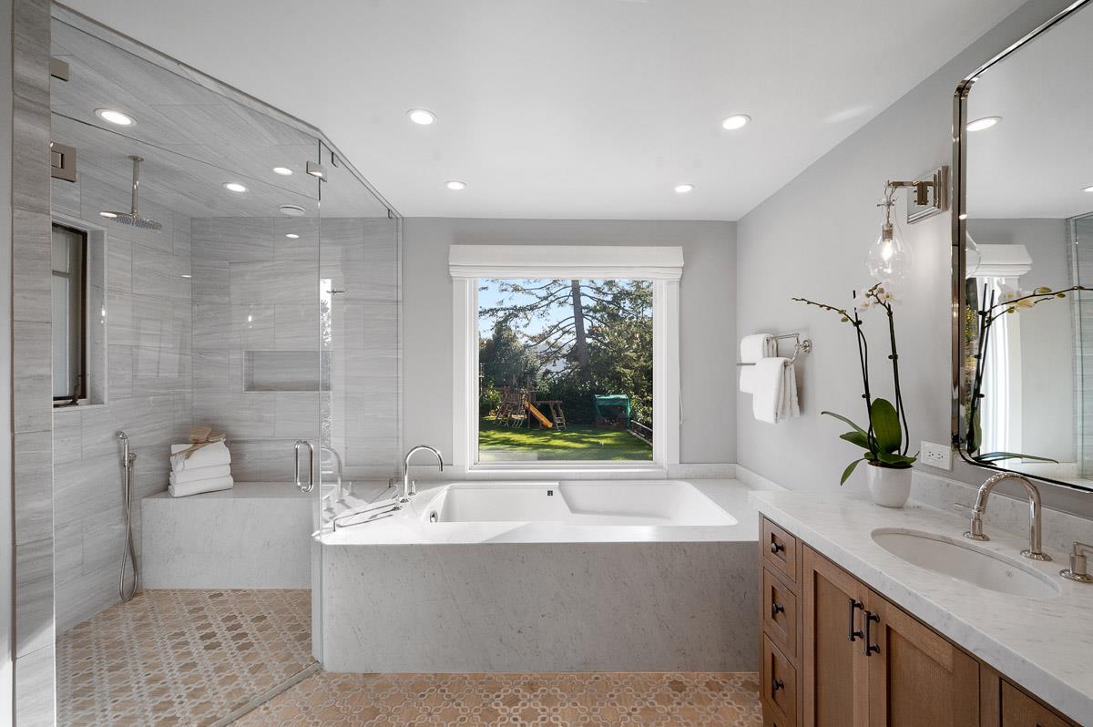220 Ware Road Woodside, CA 94062 - Photo 30 of 59 a bathroom with a large tub sink and mirror