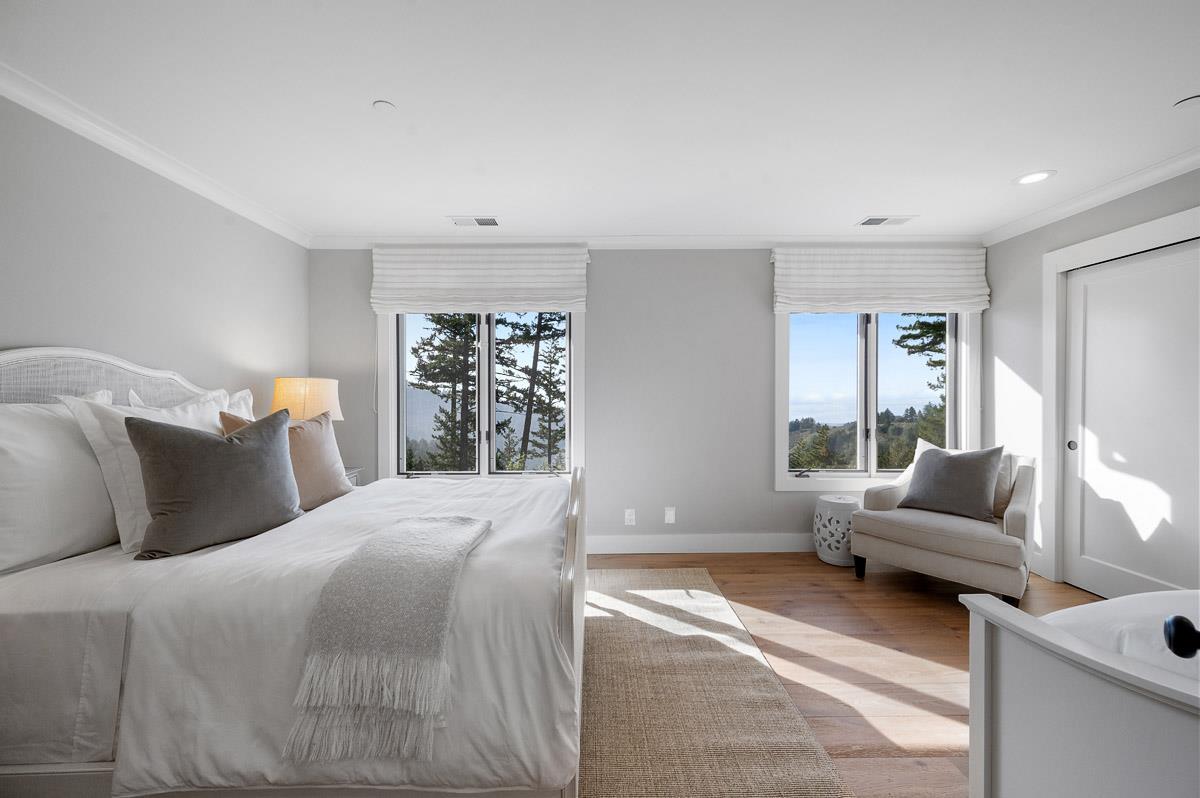 220 Ware Road Woodside, CA 94062 - Photo 31 of 59 a bedroom with a large bed and a couch