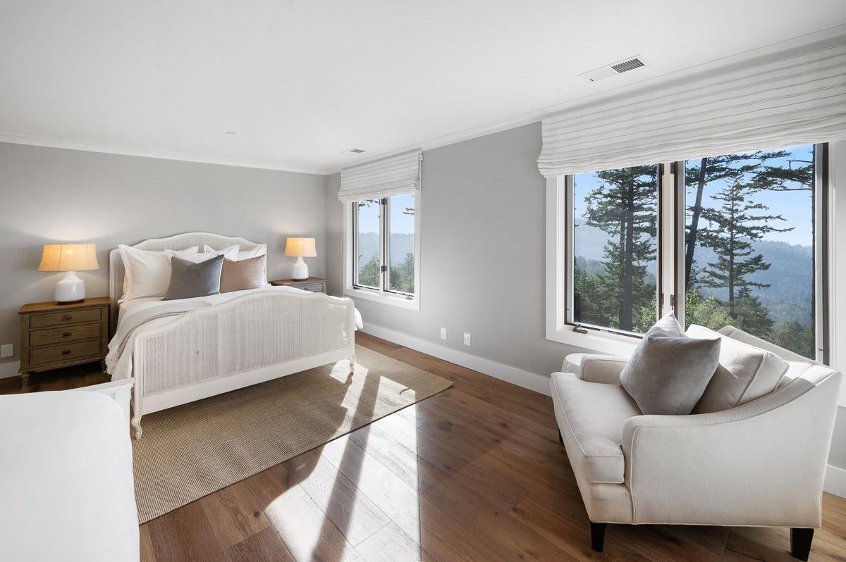 220 Ware Road Woodside, CA 94062 - Photo 32 of 59 a bedroom with furniture and large window
