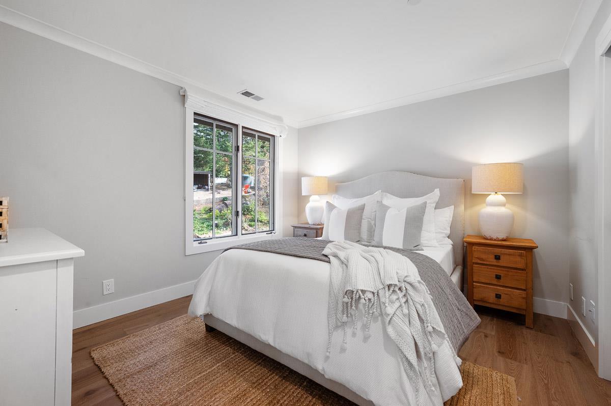 220 Ware Road Woodside, CA 94062 - Photo 34 of 59 a bed room with a bed and a window