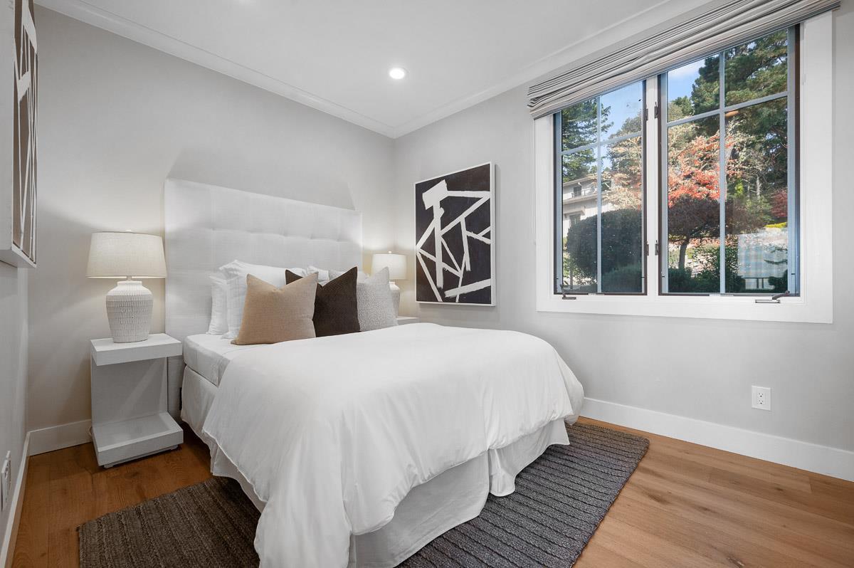 220 Ware Road Woodside, CA 94062 - Photo 35 of 59 a bedroom with bed and a large window