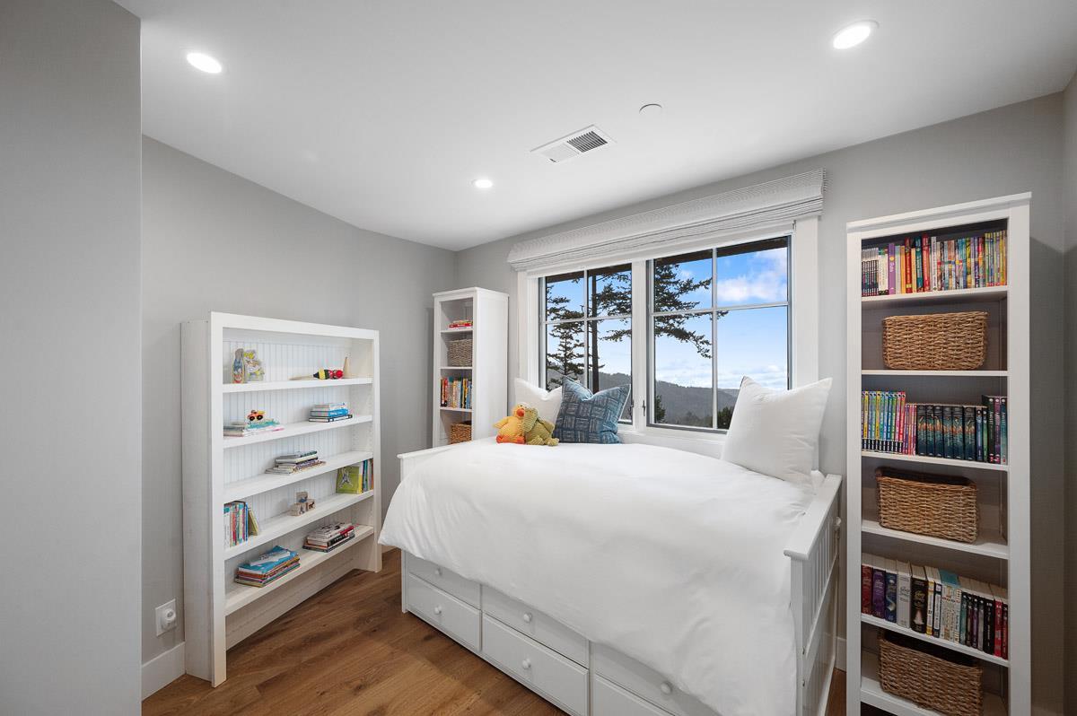 220 Ware Road Woodside, CA 94062 - Photo 36 of 59 a bedroom with a large bed and a window