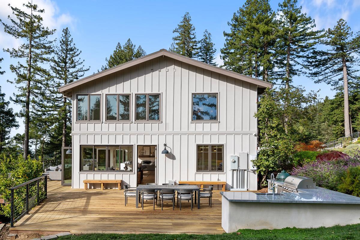 220 Ware Road Woodside, CA 94062 - Photo 39 of 59 a view of house with yard outdoor seating and lake