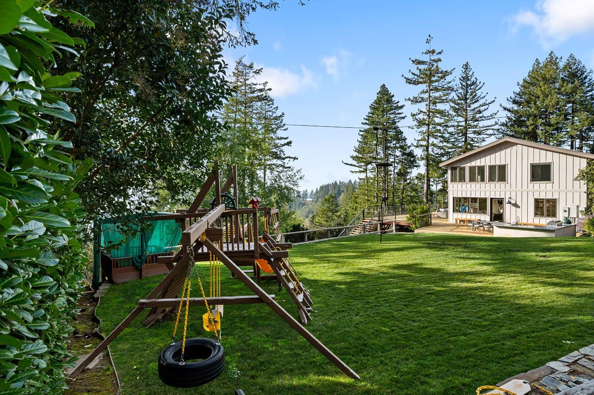 220 Ware Road Woodside, CA 94062 - Photo 40 of 59 a house view with a play ground and entertaining space