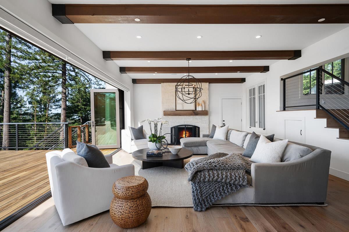 220 Ware Road Woodside, CA 94062 - Photo 4 of 59 a living room with furniture fireplace and a large window