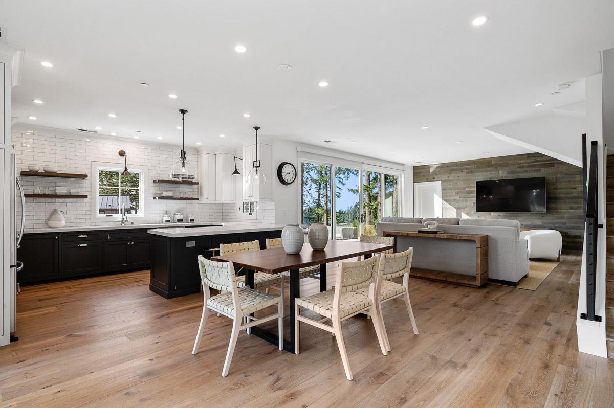 220 Ware Road Woodside, CA 94062 - Photo 43 of 59 a large kitchen with a table and chairs