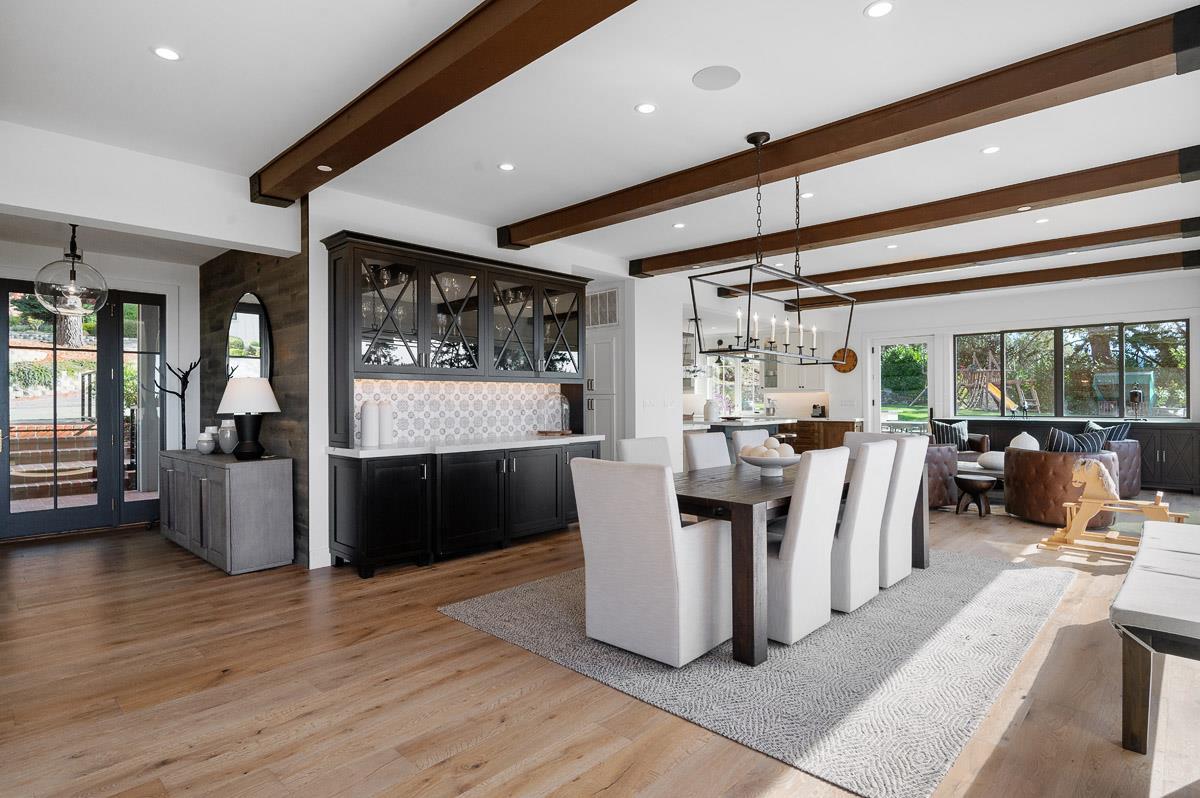 220 Ware Road Woodside, CA 94062 - Photo 10 of 59 a living room with furniture a large window and wooden floor