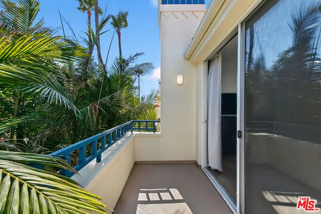 a view of balcony with small garden