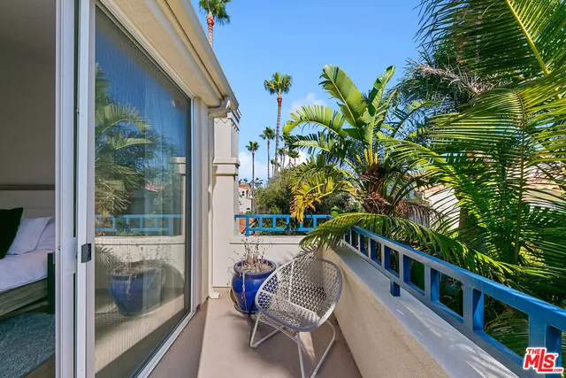 a bathroom with a sink double vanity granite tub shower and a mirror
