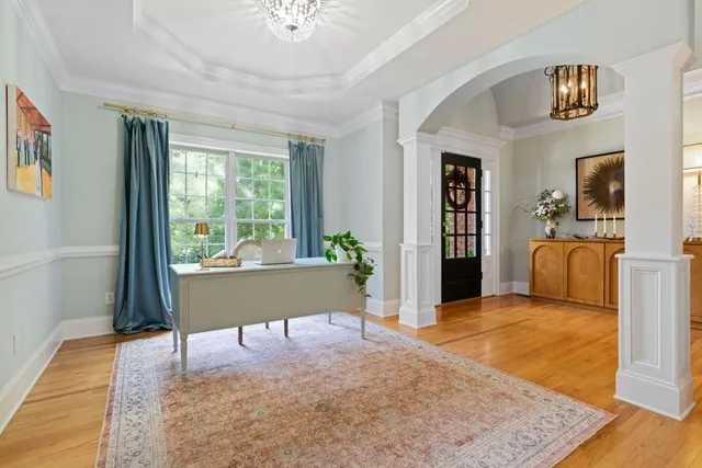 a kitchen with stainless steel appliances a sink stove refrigerator and cabinets