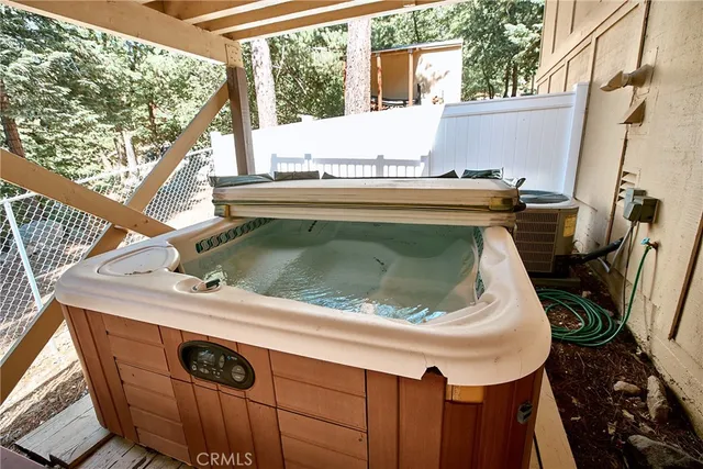 a front view of a house with a deck