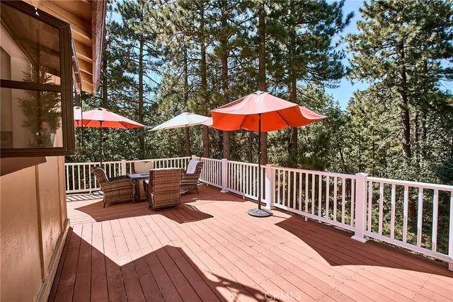 a view of balcony with wooden floor