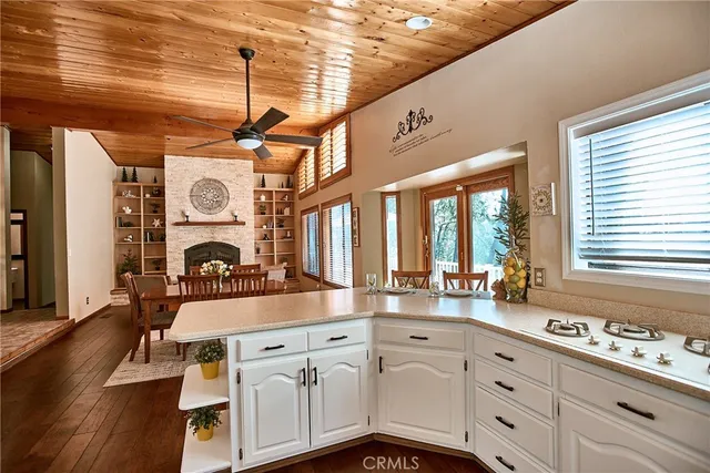 a bath tub sitting in a bathroom next to a sink