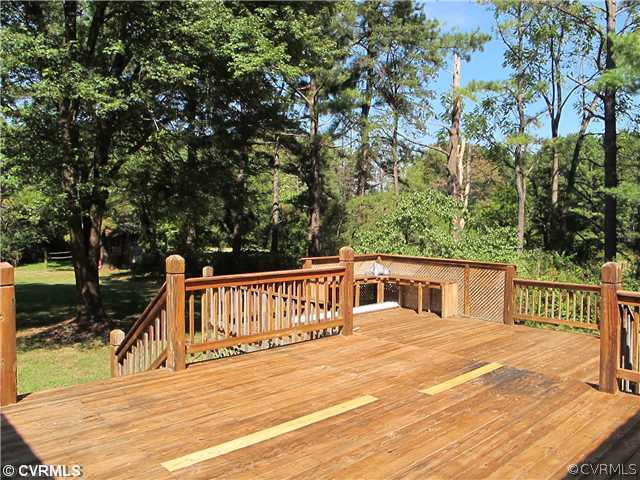 1994 Shallow Well Road Manakin-Sabot, VA 23103 - Photo 23 of 23 a view of a house with backyard and deck