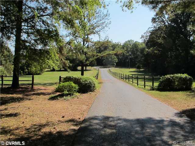 1994 Shallow Well Road Manakin-Sabot, VA 23103 - Photo 3 of 23 a view of a street with a yard and trees