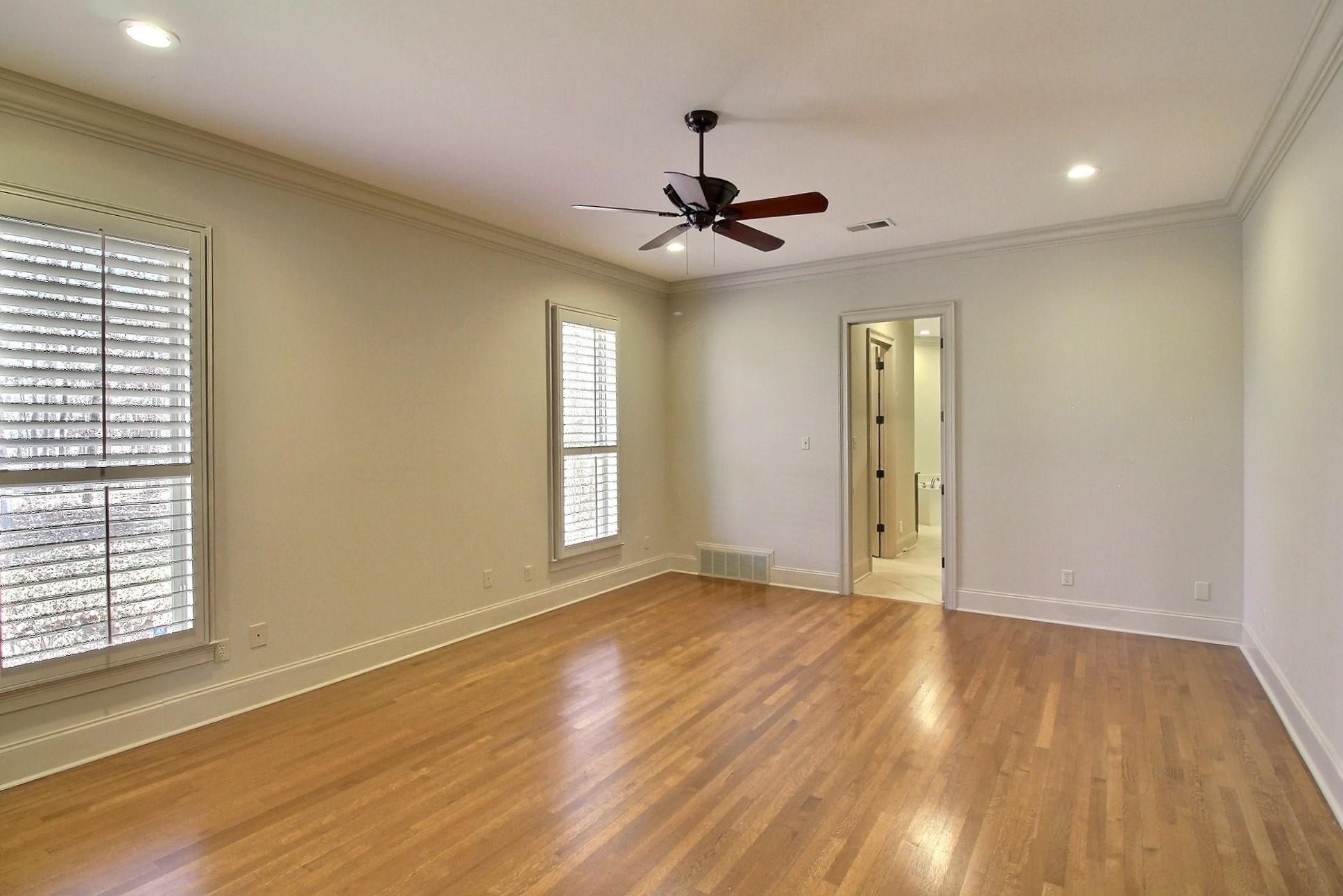 580 Hickory Lake Road Eads, TN 38028 - Photo 23 of 40 wooden floor in an empty room with a window