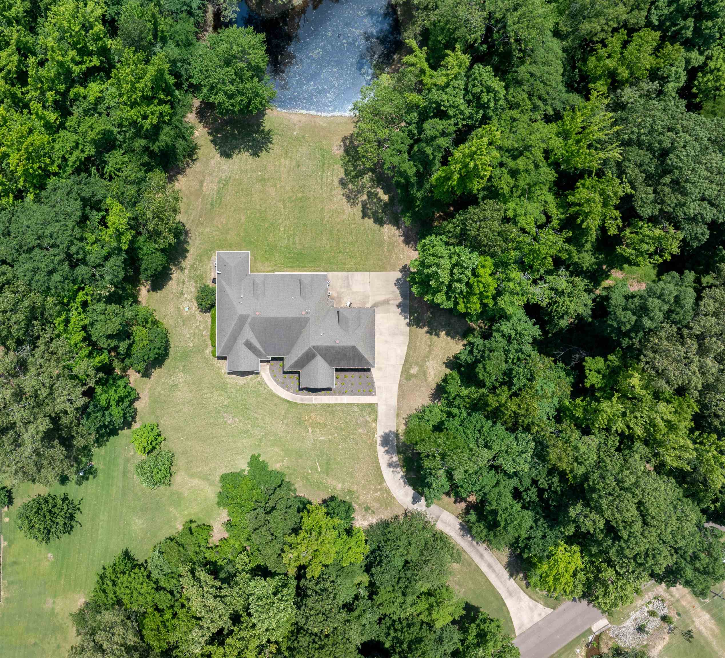 580 Hickory Lake Road Eads, TN 38028 - Photo 3 of 40 an aerial view of residential house with outdoor space and trees all around