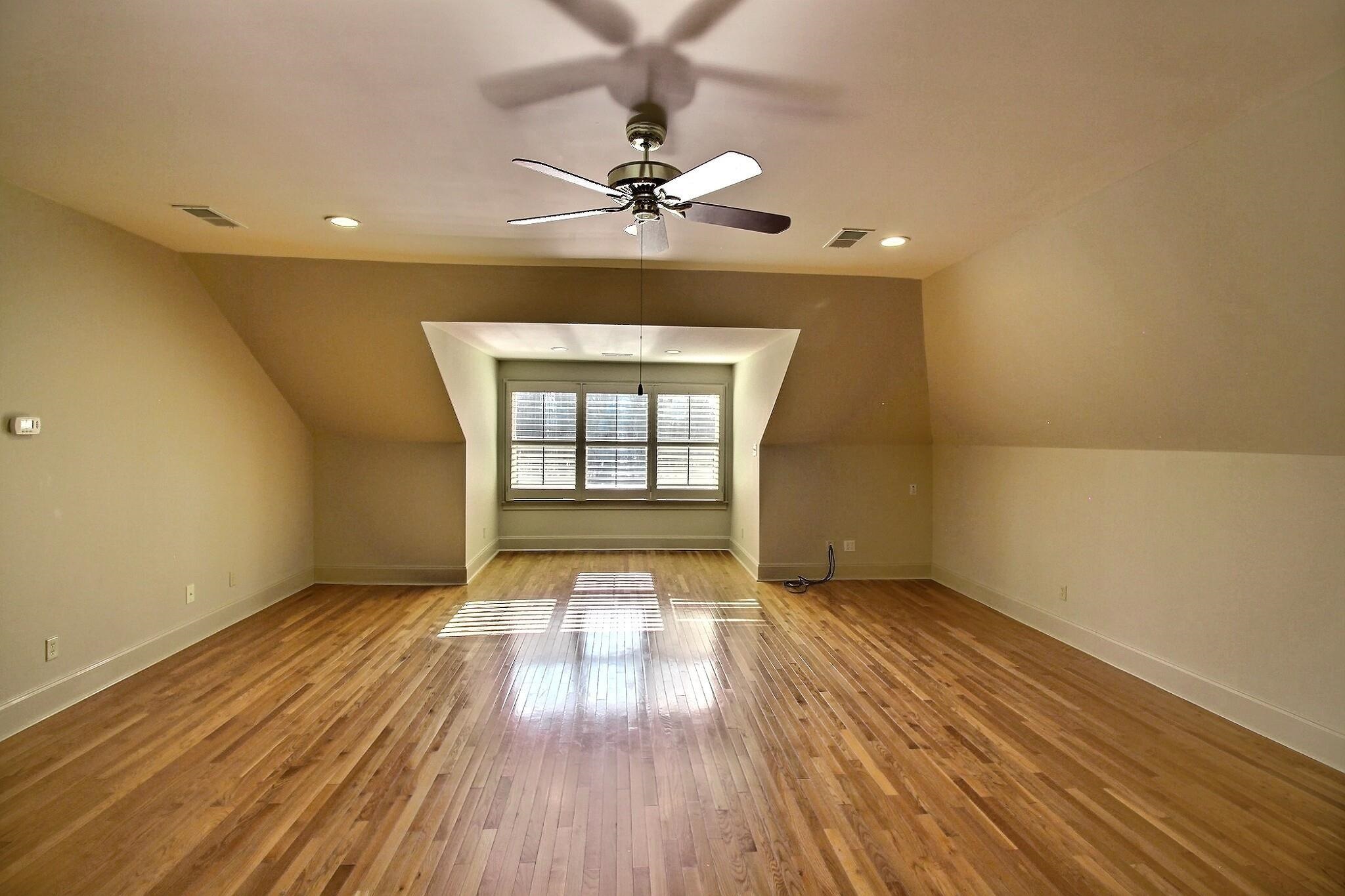 580 Hickory Lake Road Eads, TN 38028 - Photo 38 of 40 a view of an empty room with wooden floor and a window