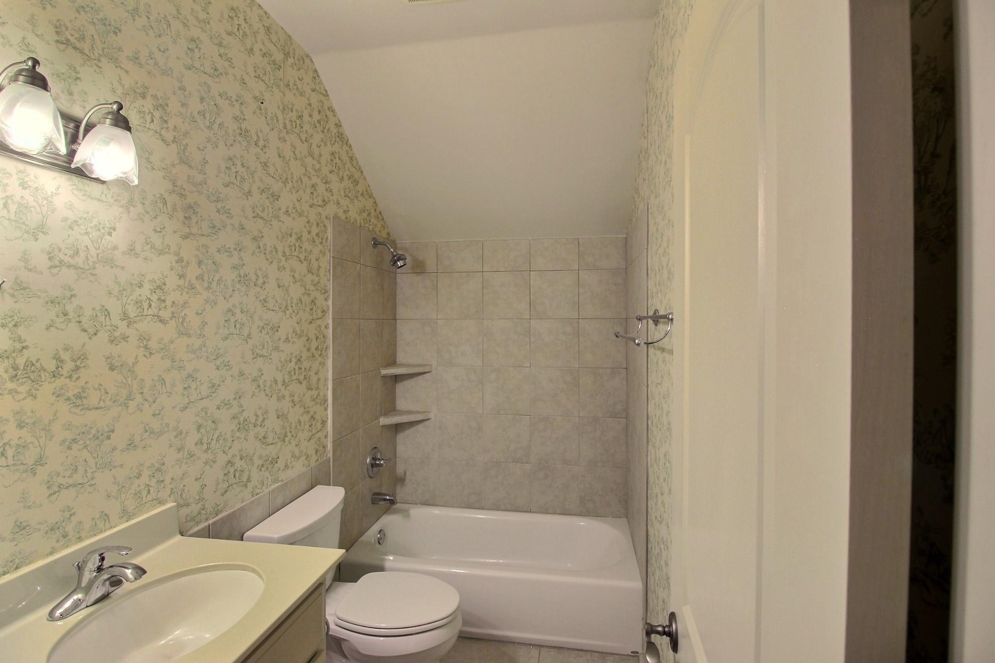 580 Hickory Lake Road Eads, TN 38028 - Photo 39 of 40 a bathroom with a granite countertop bathtub shower sink vanity and toilet