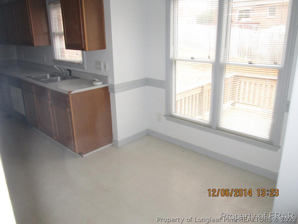 5029 Summer Ridge Road Fayetteville, NC 28303 - Photo 8 of 26 a view of an empty room with a window