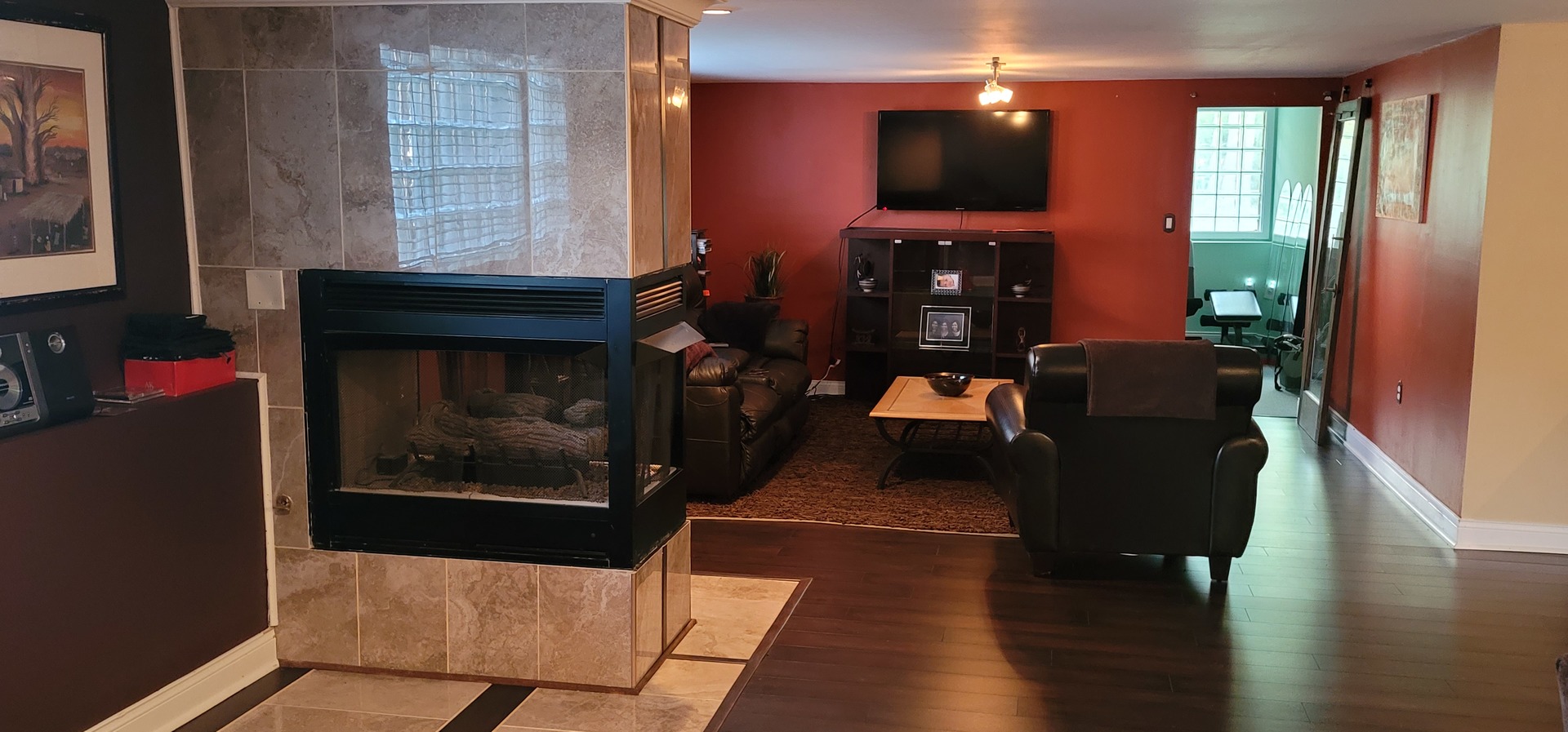 1045 Wingate Road Olympia Fields, IL 60461 - Photo 19 of 28 a living room with furniture and a fireplace