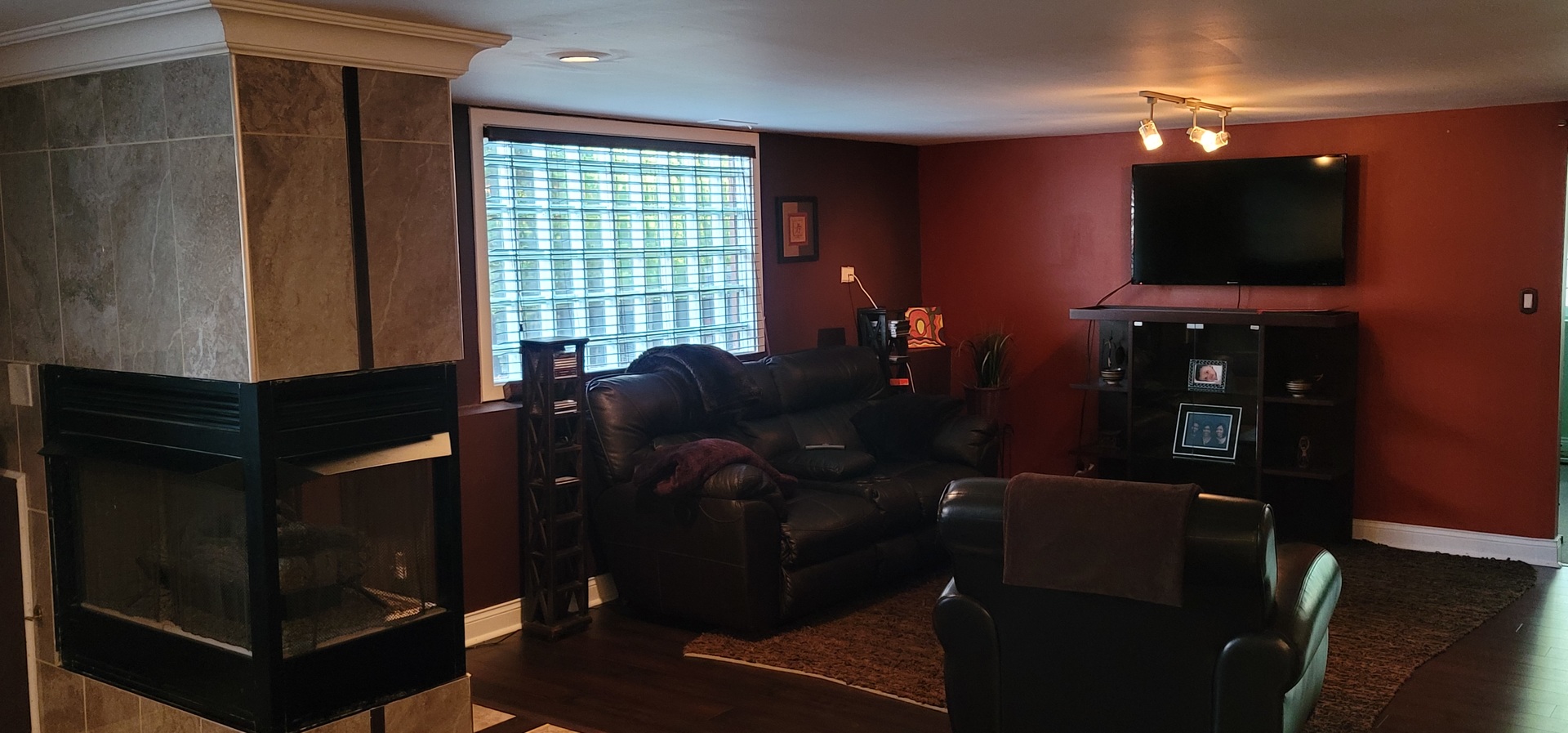 1045 Wingate Road Olympia Fields, IL 60461 - Photo 20 of 28 a living room with furniture and a flat screen tv