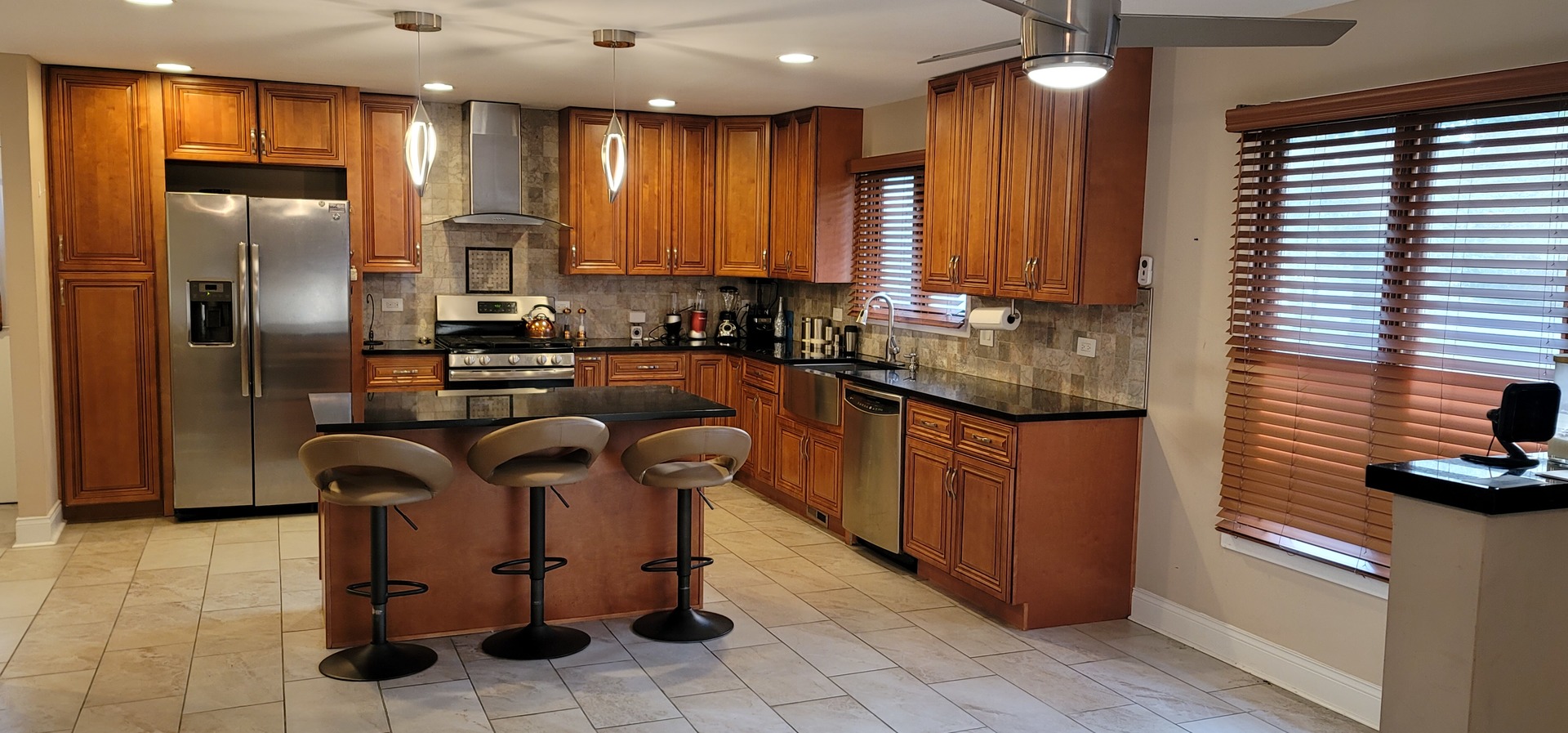 1045 Wingate Road Olympia Fields, IL 60461 - Photo 7 of 28 a kitchen with stainless steel appliances granite countertop a sink a stove and a refrigerator
