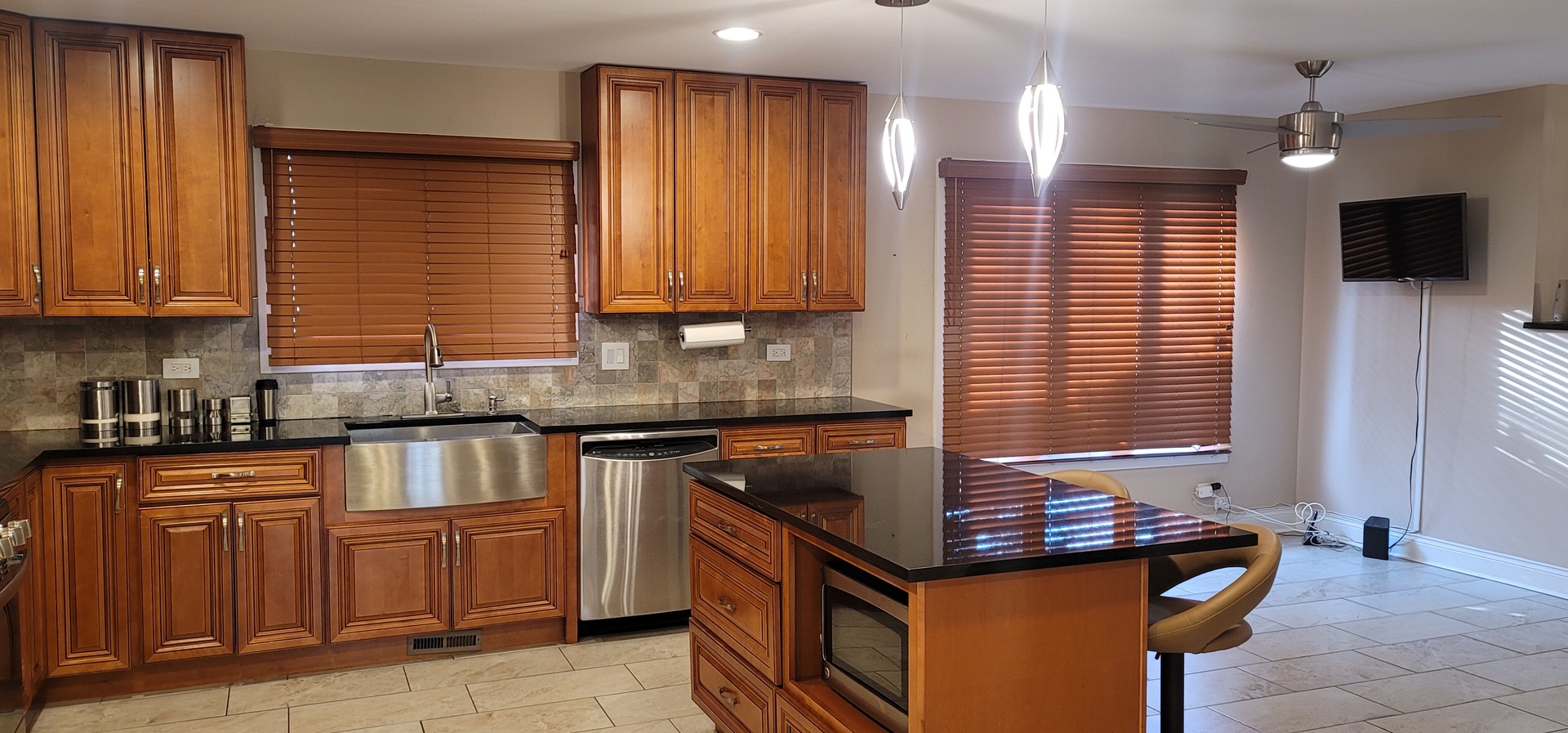 1045 Wingate Road Olympia Fields, IL 60461 - Photo 10 of 28 a kitchen with stainless steel appliances granite countertop a stove sink microwave and cabinets