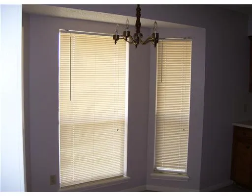 a view of a room that has a window
