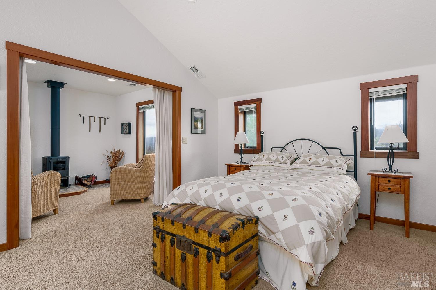 2151 Guntly Road Philo, CA 95466 - Photo 14 of 43 a bedroom with a bed and a couch