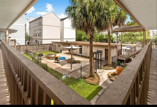 a view of swimming pool with chairs