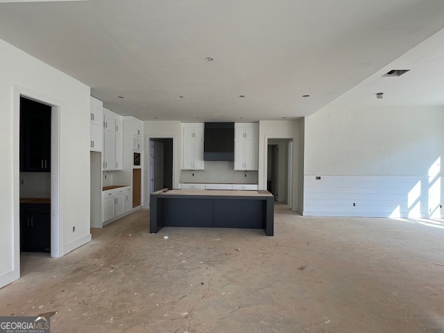 5470 Settingdown Road Cumming, GA 30028 - Photo 6 of 19 a living room with a couch and a refrigerator