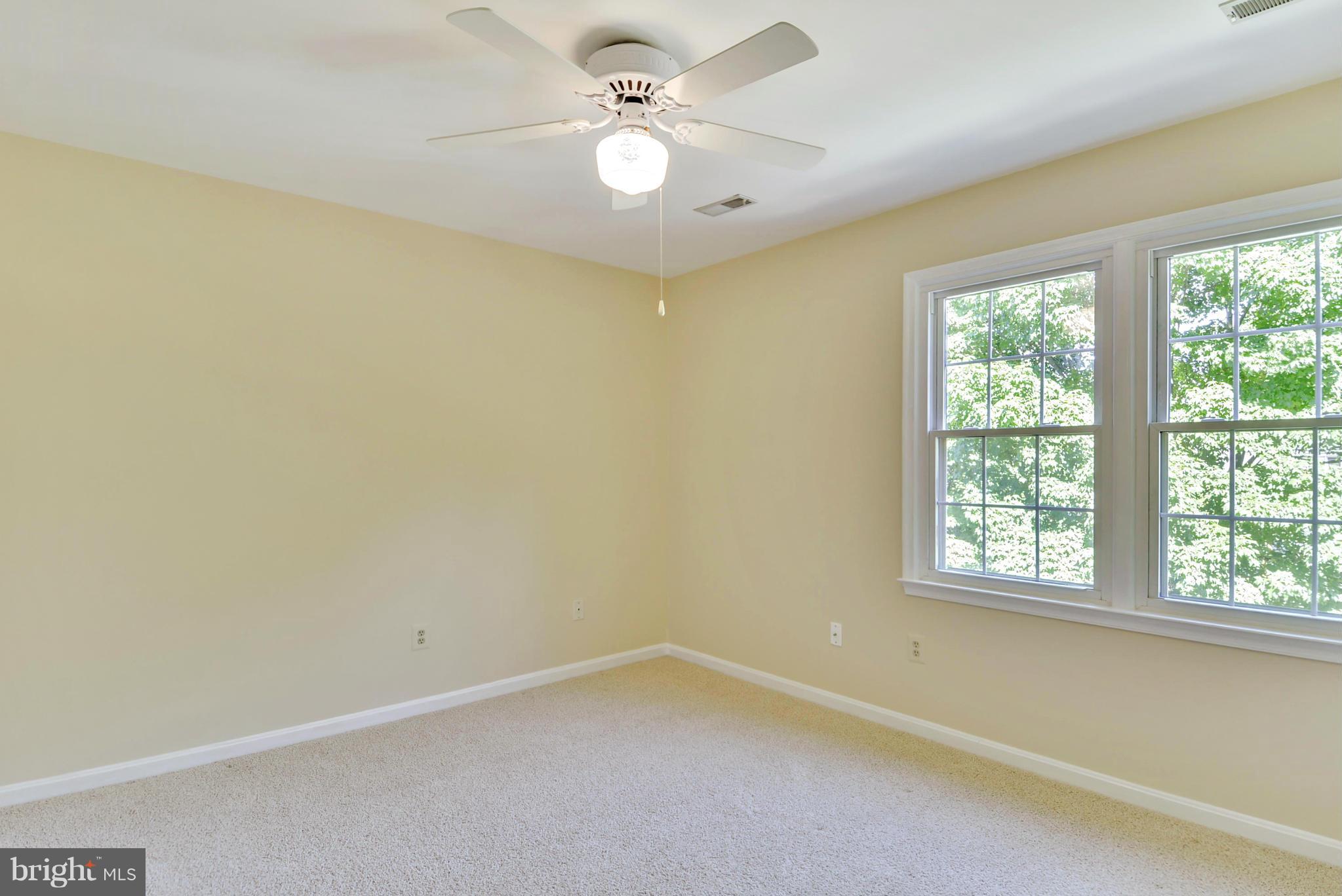 10611 Margate Road Silver Spring, MD 20901 - Photo 19 of 30 an empty room with a window and a fan