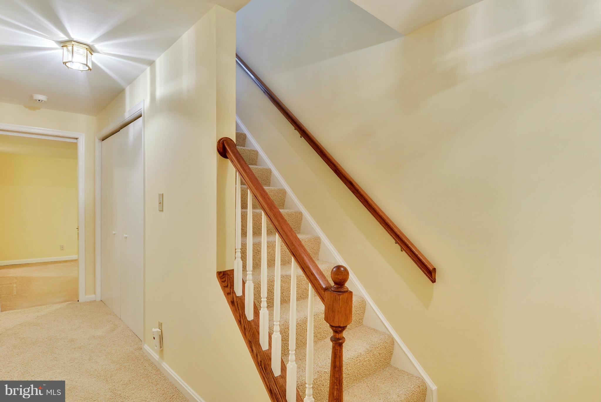 10611 Margate Road Silver Spring, MD 20901 - Photo 21 of 30 a view of staircase with railing and white walls
