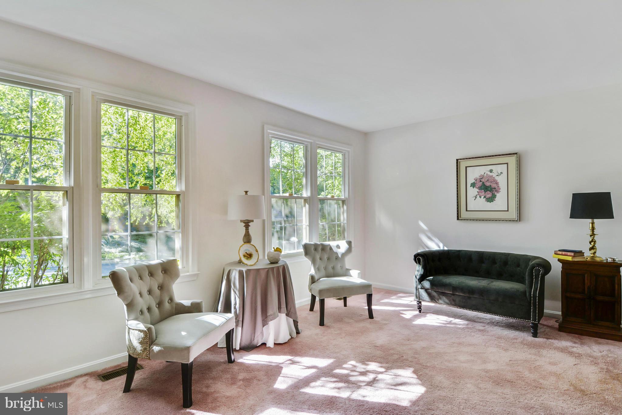 10611 Margate Road Silver Spring, MD 20901 - Photo 4 of 30 a living room with furniture and a large window