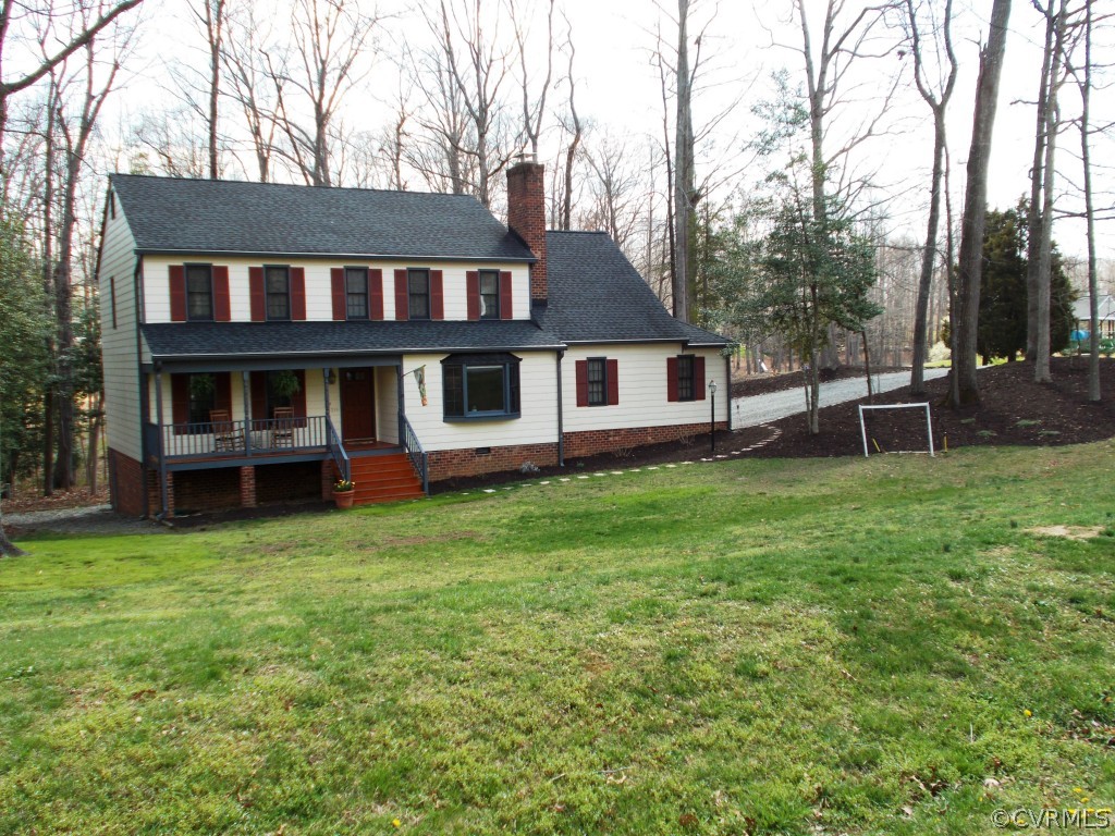 1319 Kingscross Road Midlothian, VA 23114 - Photo 23 of 23 a view of a house with a yard and sitting area